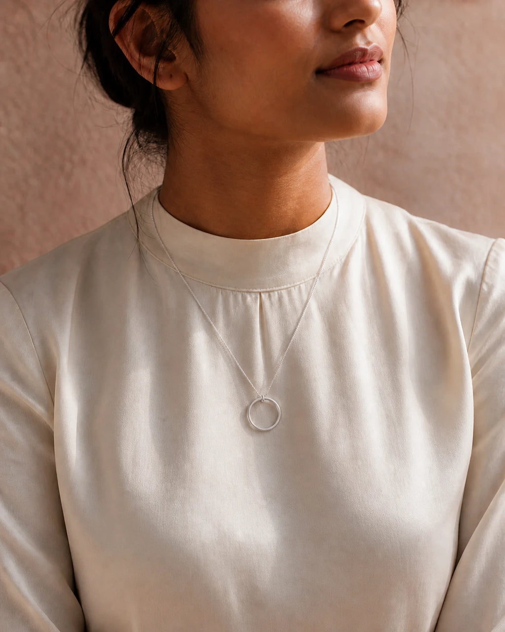 Facetta Multi Stone Pendant in an ARYAMOND editorial image