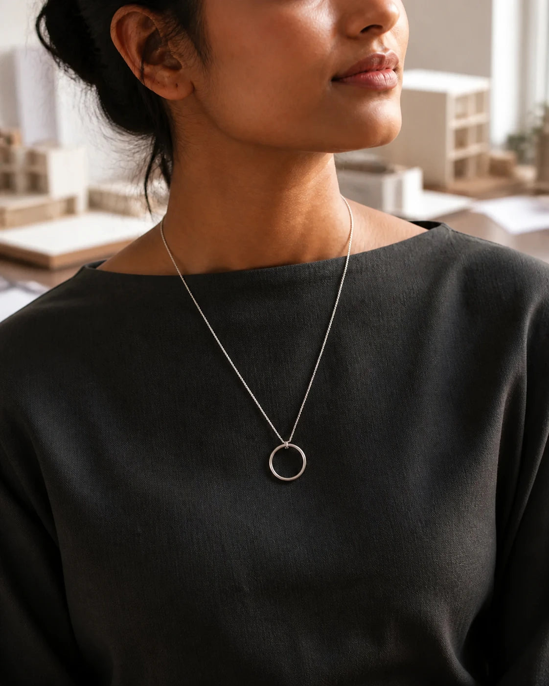 Facetta Multi Stone Pendant in an ARYAMOND editorial image