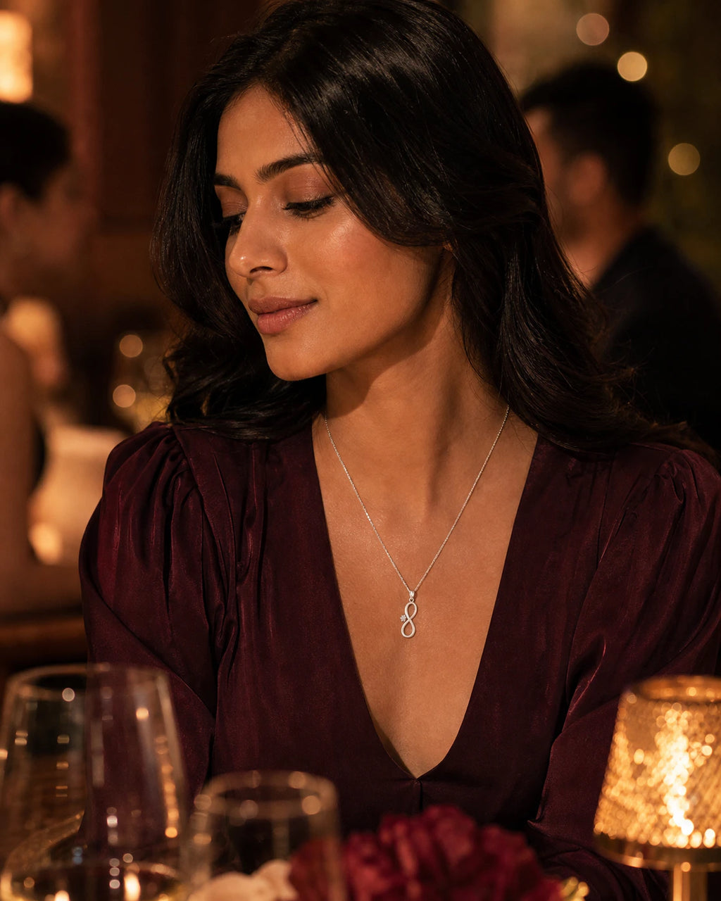 Infinity Solitaire Pendant in an ARYAMOND editorial image